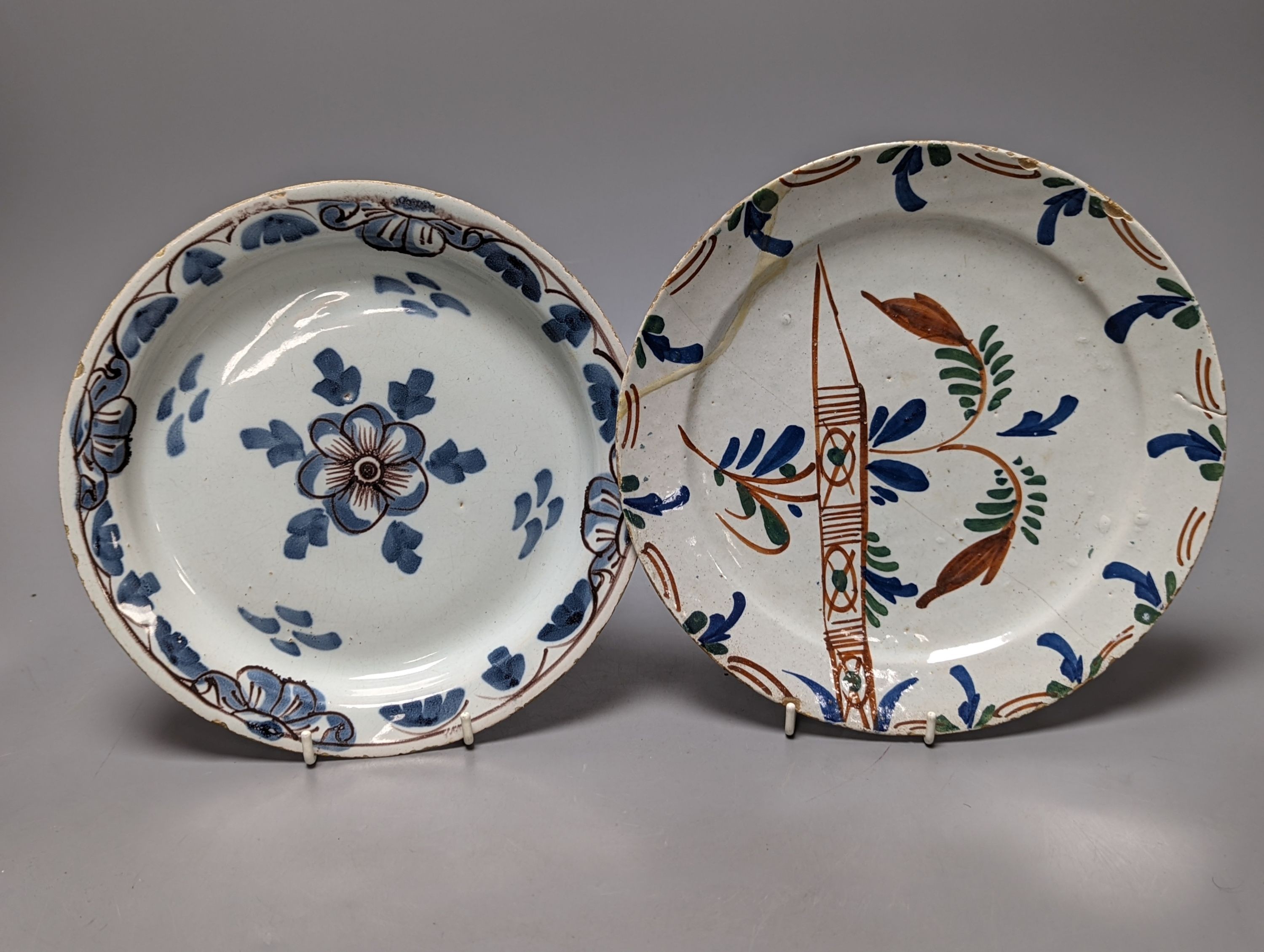 Seven English and Dutch delftware plates and dishes, c.1700-1760, 22 - 23cm, some damage